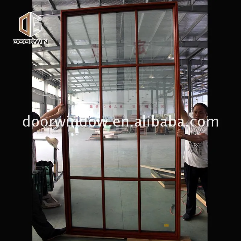 American building code aluminum wood frame glass doors and crank out windows by Doorwin