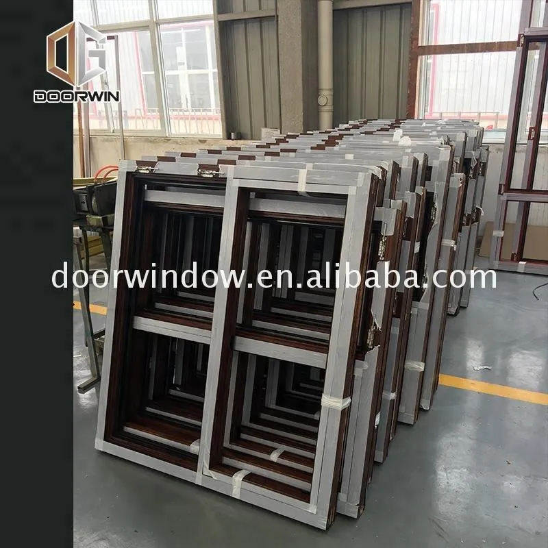 Doorwin 2021AS2208 standard glass bathroom window wood double glazed tempered obscure awning window by Doorwin on Alibaba